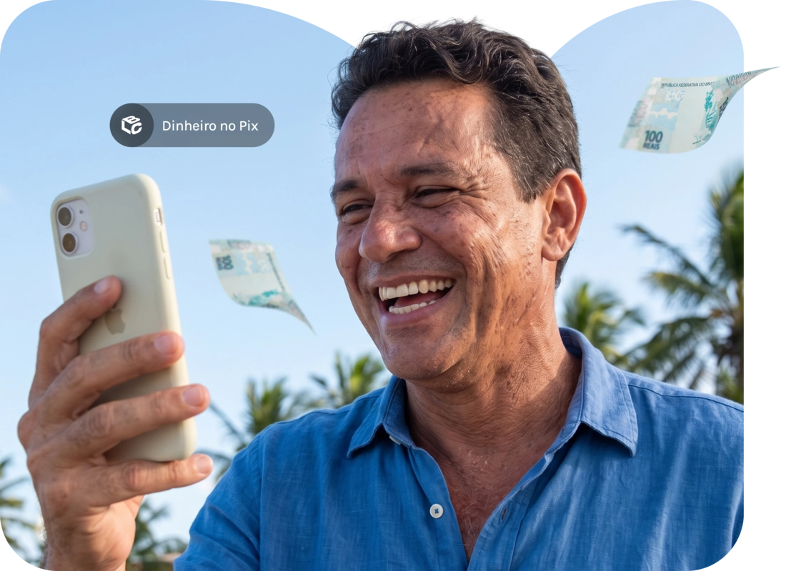 Homem sorri ao usar celular com dinheiro Pix voando